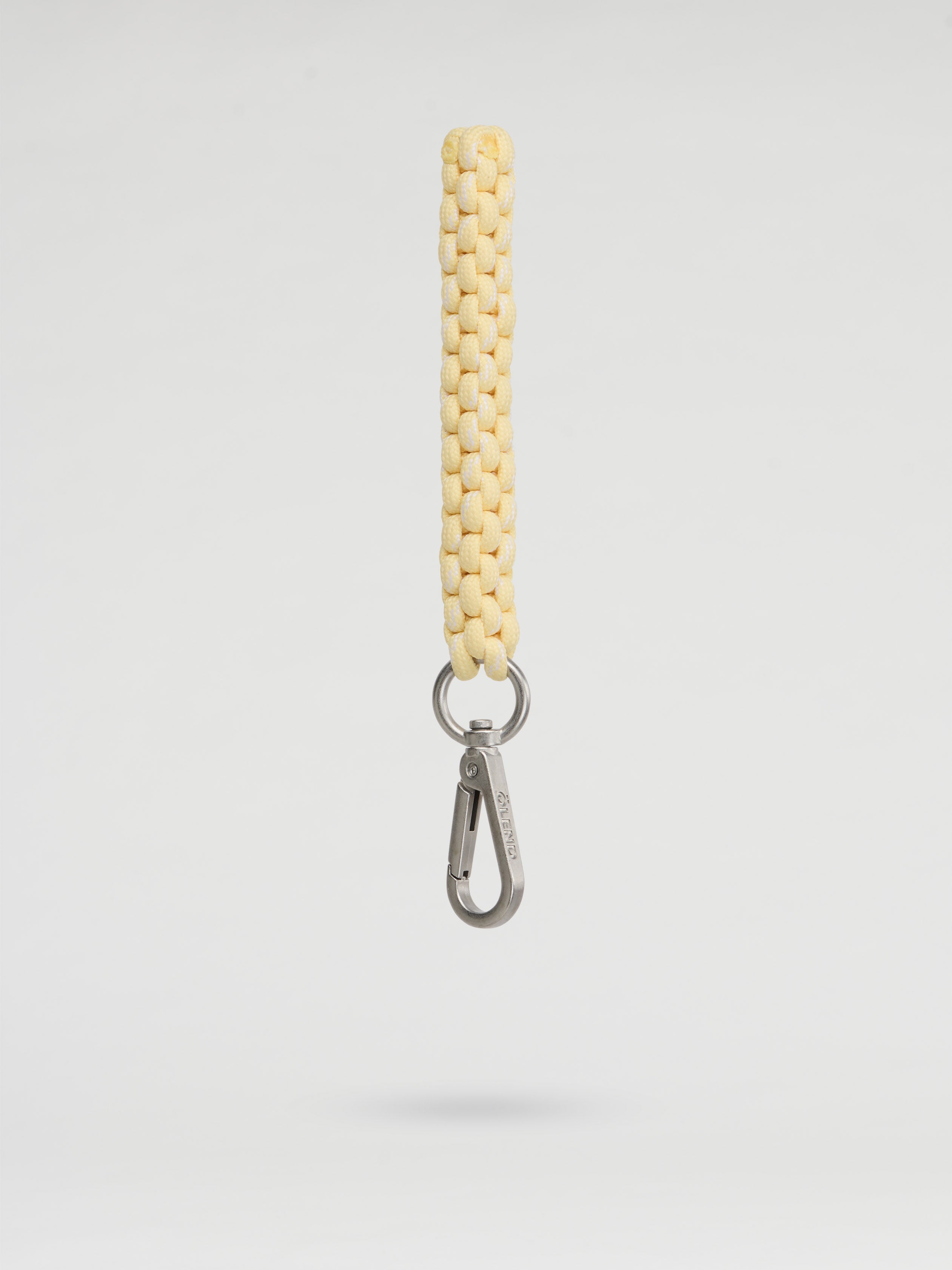 Olend Climbing Keychain in butter yellow — woven paracord keychain with silver carabiner clip, lightweight bag charm for keys