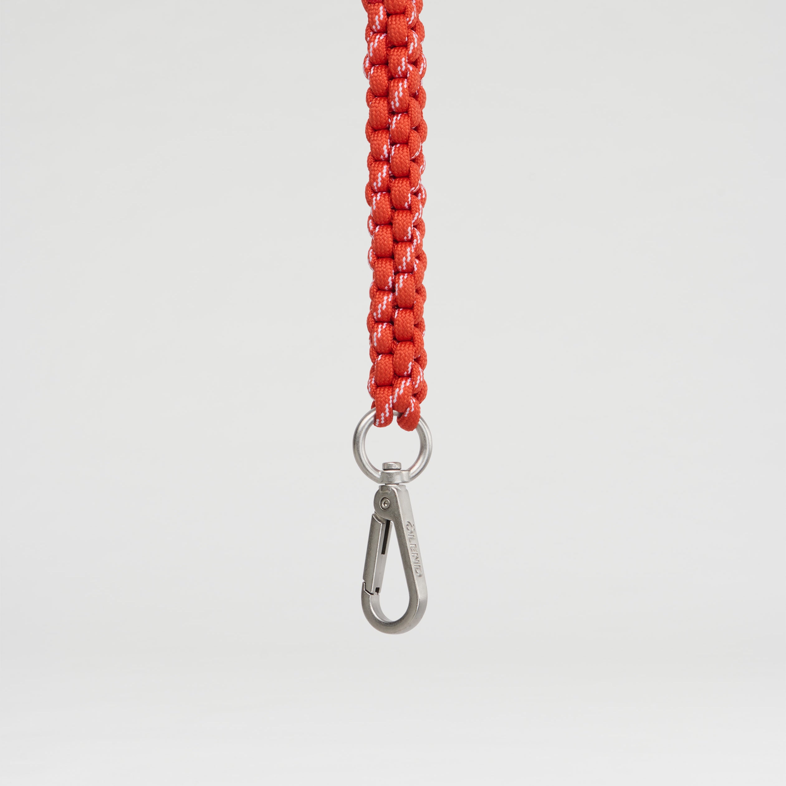 Olend Climbing Keychain in coral — woven paracord keychain with silver carabiner clip, vibrant key holder for bags and backpacks