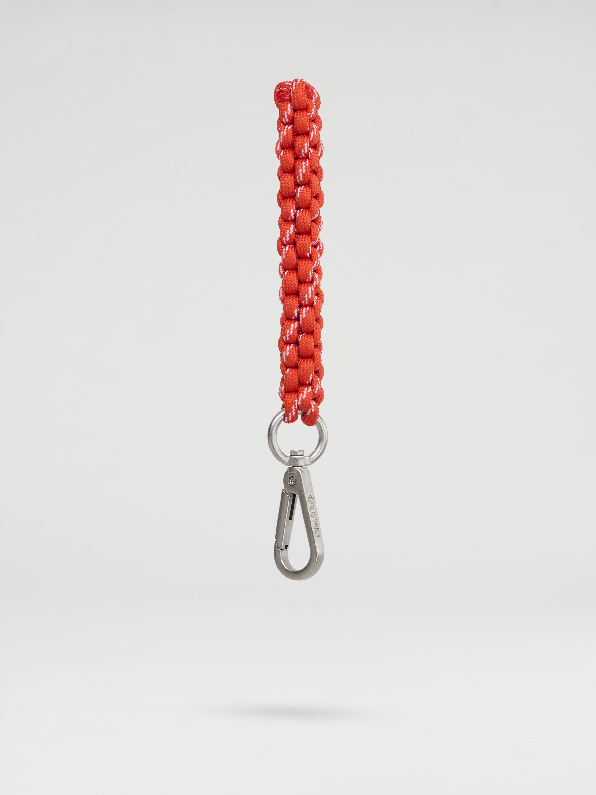 Olend Climbing Keychain in coral — woven paracord keychain with silver carabiner clip, vibrant key holder for bags and backpacks